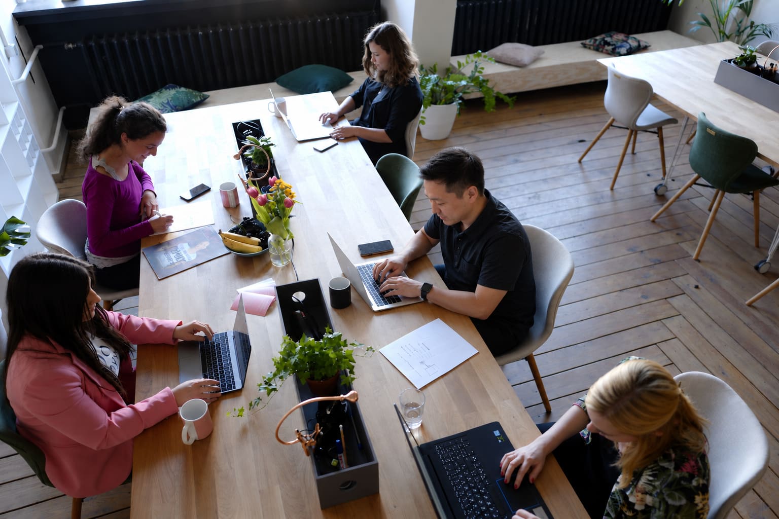Team working at a wooden table